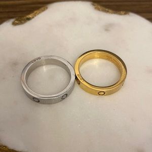 pair of love rings 4mm silver and gold size 8.5